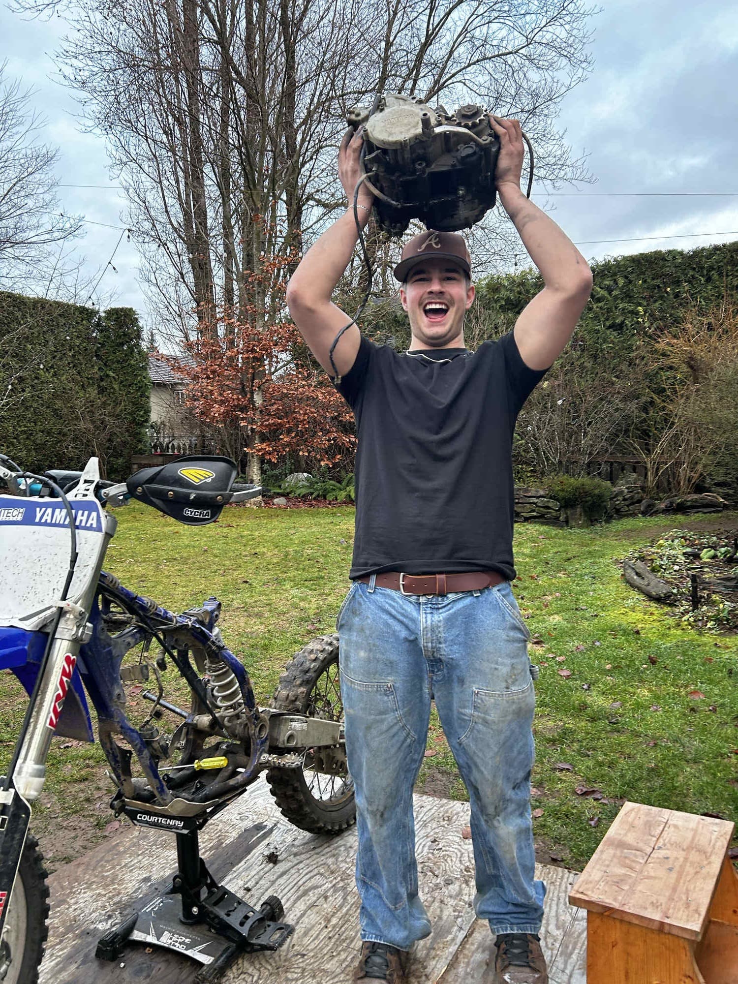 Austin Salt working on a dirt bike engine